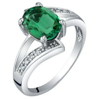 Oravo 1. CT ovalni oblik stvorio je smaragdni i dijamantski Bypass prsten od 14k bijelog zlata
